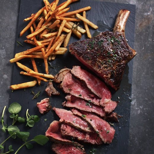30-day dry aged Côte De Boeuf, topped with a herb butter, sliced thickly and served with seasoned chips. Enjoy 25% off our entire Waitrose 1 range, the very best of Waitrose: http://bit.ly/2vddXQu | Waitrose & Partners