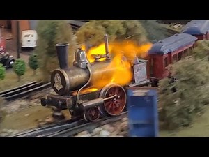 Historical tinplate steam and electric powered toy trains in 0 gauge