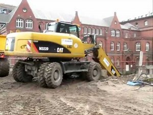 Bagger Caterpillar M322D / Excavator
