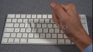 Businessman punches computer and keyboard that doesn't work - problems at work in office and smart working - hysterics against internet and modern technology, online addiction- virus and hackers Stock Video