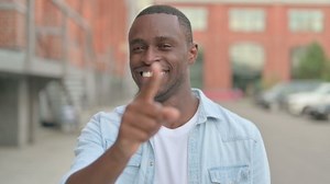Outdoor Portrait African Man Pointing Camera Stock Footage Video (100% Royalty-free) 1077909845 | Shutterstock