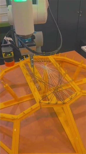 3D fiber weaving using robotic arms for architectural applications