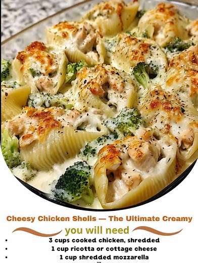 Cheesy Chicken Shells — The Ultimate Creamy, Comforting Pasta Bake "Last night, as I pulled this bubbling dish from the oven, my kids rushed to the table, and I knew I had hit the jackpot. The cheesy goodness melted their hearts and filled their bellies!" This Cheesy Chicken Shells recipe is a delightful blend of flavors and textures that makes weeknight dinners feel like a special occasion. Ingredients 12 large pasta shells 2 cups cooked, shredded chicken 1 cup ricotta cheese 2 cups shredded mo