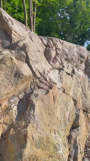 Can you tell where the real rock ends and fake rock begins? This project was amazing to be a part of! Our clients wanted to use local natural stone to create a retaining wall surrounding their pool, and since their yard is lower then their neighbour, we were asked to raise the wall up a few feet with our panel system and replicate that existing stone with carving techniques and paint! We think it turned out amazing! What do you think? Watch how we did it here: https://youtu.be/VPLZ1LCEN18?si=Lzi