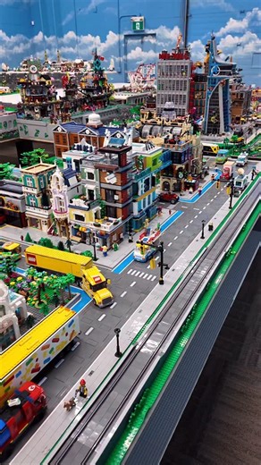 Bricksie on YouTube on Instagram: "LEGO Shopping Street placed in the city!"