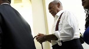 See Bill Cosby leave court in handcuffs