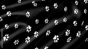 Animal paw prints on black animated fabric. Abstract background with traces of the beast.