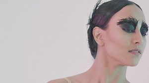 Portrait of a ballet dancer on a white background - Free Stock Video