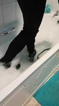 Girlfriend fully clothed, coat thigh high boots the let in bubble bath