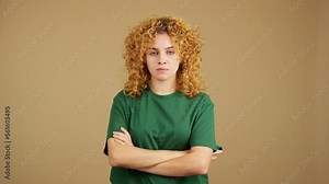 Woman crossing the arms with an angry expression