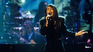 Jay-Z Seen Cozying up to Aaliyah in Never-Before-Seen Photos Taken a Year Before Her Death