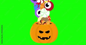 the skeleton's hand brings a Halloween candy basket and candies start pouring into it.. Green screen.2D 4K