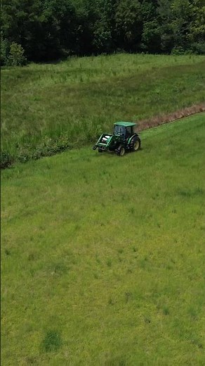 John Deere Tractor cutting Hay with Disc Mower