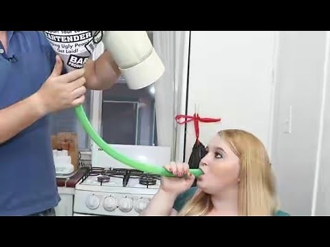 23-year-old Tammy force feeds herself through a FUNNEL so she can become as fat as possible .