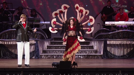 "CARA MIA" In this video, 24K Gold Music Shows presents Cara Mia. This song was always a fan favorite. Doyle always put his all into the vocal presentation, and the girls added a lot of style and flavor with their beautiful costumes and “dancing fans”. “Cara Mia”, Italian for my beloved, was sung by Jay & the Americans (1965) and David Whitfield (1954) as well as numerous other musical artists. Whitfield’s version sold more than three-and-a-half million copies. Mantovani’s string orchestra playe