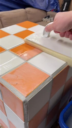 Colorful Checkered Rubens Cube with White and Orange Tiles