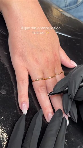 Sydney on Instagram: "Tattooed a very tiny Aquarius constellation on my client Alisa’s finger this week ♡ Done at @syzygytattooing in Scottsdale, AZ #tattoo #tattooartist #tattooideas"