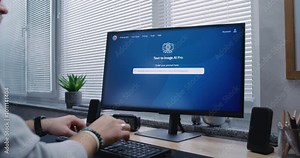 Adult man types prompt in artificial intelligence chatbot on PC. Advanced AI image generator app generate detailed high-quality photo portrait of sci-fi robot. AI generated image creation technology. Stock Video