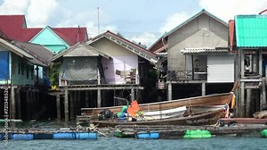 Stilt houses also called pile or lake dwellings are homes raised on stilts or piles over the surface of a body of water and are built primarily as a protection against flooding 4k high resolution