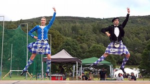 Competitors in the Highland Fling, Scottish dancing adult competition, held during the 2023 Kenmore Highland Games. These friendly Games are held on the first Wednesday in July by Loch Tay at Kenmore in Perthshire, one of the few evening Highland Games in Scotland. The dancers included Hamish McInnes from Australia, a champion Highland dancer, and we think the young lady may be Lyndsey Douglas. #highlanddance #highlandfling #scottishdancing #kenmore #highlandgames | Scotland Online