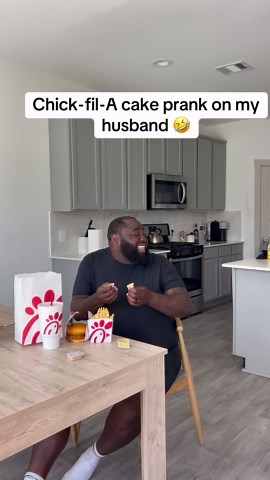 My husband's reaction when his whole Chick-fil-A meal turned out to be a cake