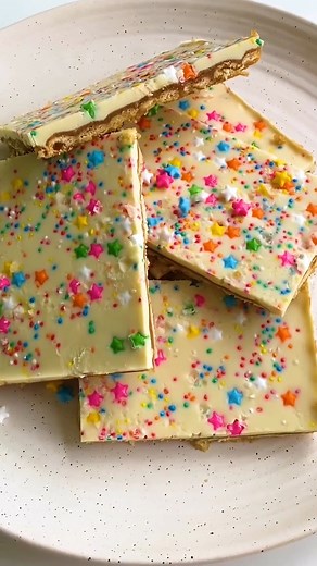 It's Fairy Bread day and we're celebrating with this fairy bread version of our best-ever Christmas crack. Get the recipe here >>> https://www.taste.com.au/recipes/fairy-bread-christmas-crack-recipe/hq61zy0h | Taste.com.au
