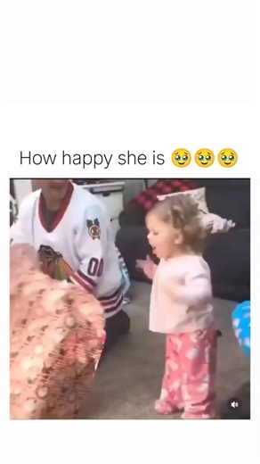 thenostalgicaddict on Instagram: "The Instagram reel shares a heartwarming video of a toddler's pure excitement on Christmas morning, unwrapping a convertible pink Minnie Mouse chair that transforms into a bed, complete with her infectious squeals and playful exploration amid family laughter. Garnering over 13,500 likes and 125,000 views, the clip evokes widespread nostalgia, with replies praising the child's unfiltered joy and one dubbing it the ultimate toy endorsement, highlighting how suc , 