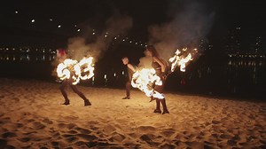 Fire jugglers on a beach - Free Stock Video