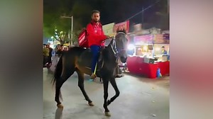 Indian food delivery driver ditches usual mode of transport for horse