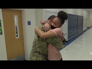 Military dad surprises daughters at school by returning home early