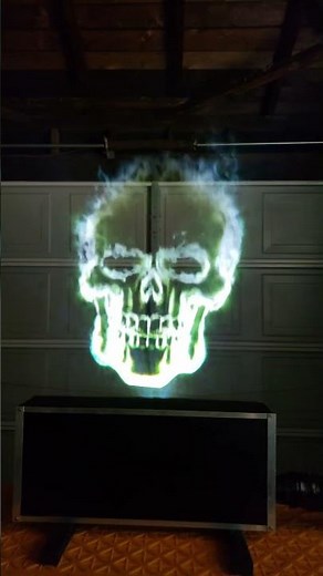 Floating Neon Skull On A Fog Machine and Projector