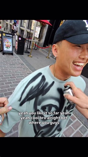 Spraypaintguy on Instagram: "Would YOU say yes? This quickly?! Was totally shocked when i walked up to this dude to spray paint an abstract face on his shirt and he instantly said yes! Had a great time talking to him n getting to know him while i painted his shirt n then once I was done we went our separate ways! Was a perfect interaction in my book! #StreetArt #SprayPaintArt #CustomClothing #LiveArt #ArtReels #montréal #montrealart #SprayPaintGuy"