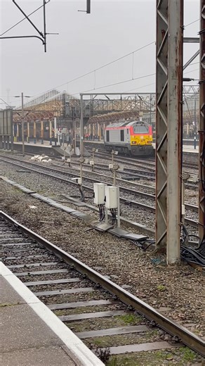 Class 67 (67017) arriving at Crewe station. This locomotive is operated by DB Cargo UK. The Class 67 are diesel-electric locomotives originally built for the English Welsh & Scottish Railway (EWS). 30 were built between 1999 and 2000 by Alstom at Meinfesa in Valencia, Spain with drive components (engine, generator and traction motors) from General Motors' Electro-Motive Division. They have an EMD 12N-710G3B-EC engine which produces 3,200bhp. They have a top speed of 125mph in the UK, but a speed