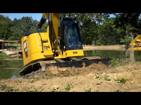 The Cat® 315F Hydraulic Excavator Pushing Dirt