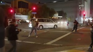 Video shows man driving minivan into crowd during DTLA protest