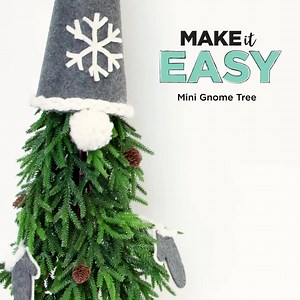 This Mini Gnome Tree adds a bit of fun to your holiday decorating. The personalization possibilities are endless! | Michaels Stores | Facebook