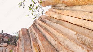 Unique volcanic basalt column formation in Kodaki village, Kutch, India. Result of an ancient volcanic fissure eruption. Natural wonder. Symmetrical geometric columns.