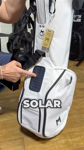 MNML GOLF Bags on Instagram: "With music playing, GPS mapping, and score-keeping, it’s easy to drain your battery on the course. Our built-in solar charger ensures you can plug-in and stay charged all day White MR2 Bag with our founder @samgouldengolf #golfbag #golfer #golfbags #mnmlgolf"
