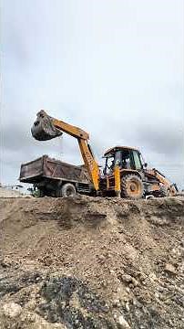 JCB 3DX BACKHOE MACHINE LOADING TRUCK.