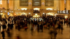Crowds of pedestrians commuting on crowded urban road busy hectic fast speed