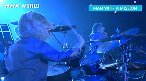 Now available online! Watch the extravagant music performance of 16 renowned Japanese artists, including MAN WITH A MISSION, a Japanese rock band with their wolf looks. | NHK WORLD-JAPAN