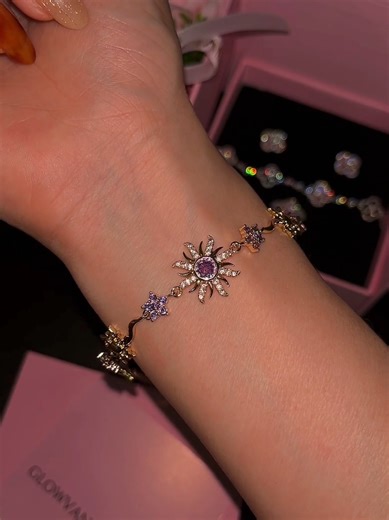 Rapunzel Inspired Purple Zircon Sun Bracelet☀️💜 Price: $350.00 TTD Available In: ♥︎ Gold ♥︎ Silver Product Details: ♥︎ Material: High-quality copper with gold plating ♥︎ Stone: Sparkling zirconia stones ♥︎ Length: 14 cm 5 cm adjustable extender ♥︎ Craftsmanship: Fully handmade with attention to detail. Care Instructions: To maintain the brilliance of your jewelry: ♥︎ Avoid contact with creams, perfumes, alcohol, or water. ♥︎ After wearing, store it in a pouch or jewelry box to prevent fading. ♥