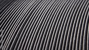 Black nail files. Flexible emery board for manicure and pedicure. Macro. Rotation. Striped texture