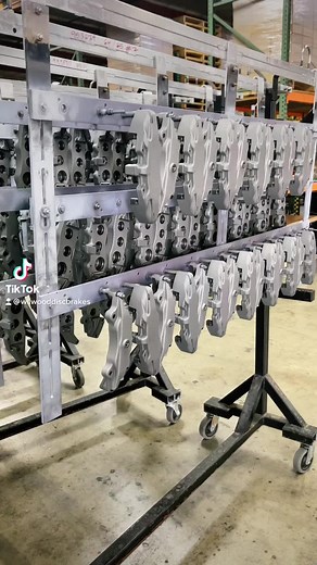 Calipers fresh out of anodizing and off to powdercoat.#wilwood #discbrakes #engineering #calipers#manufacturing #manufacturer #coating #assembly | Wilwood Disc Brakes