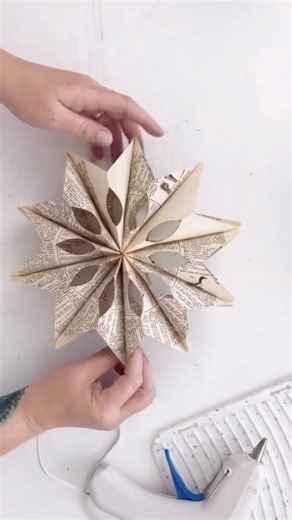 68K views · 3.2K reactions | ⭐️❄️ Do you see a star or a snowflake? ❄️⭐️ Being the book page project queen, I love these with book pages - but you can make them with any kind of paper. Here’s a throwback to last year - these are so quick and easy - if you use glue sticks they’re kid friendly too! So whatcha see... ⭐️ or ❄️ | The Shabby Creek Cottage | Facebook