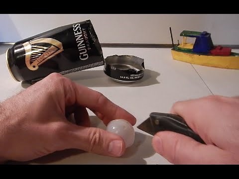 Cutting open Guinness beer can widget to see inside