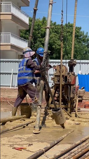 Team Soil investigation after doing the SPT test and removing the split spoon sampler