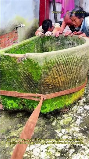 Moving Heavy Stone Tub: Teamwork to Relocate Ancient Vessel