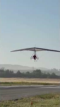 Electric hang glider landing at Petaluma airport CA