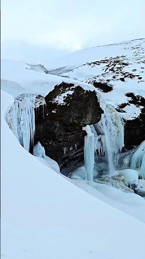 Frozen Wonders of Iceland ❄️ Stunning Waterfall in Winter’s Grip | Nature’s Icy Marvels.